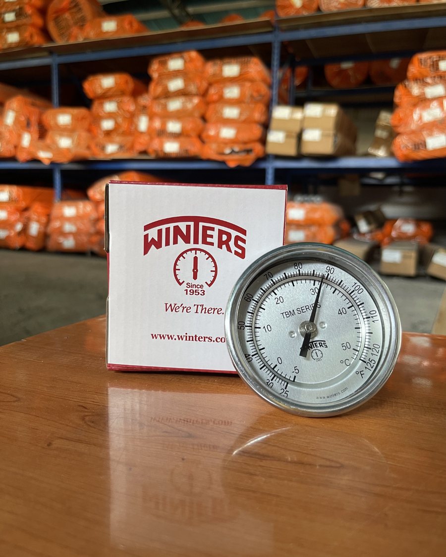 Termómetro bimetálico WINTERS TBM Series con su empaque de marca